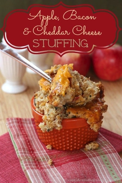 Apple Bacon & Cheddar Cheese Stuffing in a red bowl with a spoon.