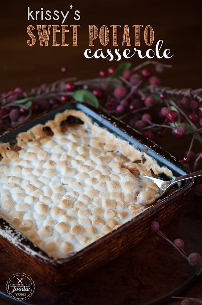 Krissy's Sweet Potato Casserole in a casserole dish with a spoon.