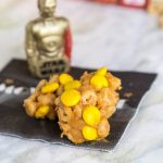 C-3PO Bites - an easy no bake snack with Honey Nut Cheerios, peanut butter, and Reese's Pieces. These bites are perfect for any Star Wars or just for snacking!