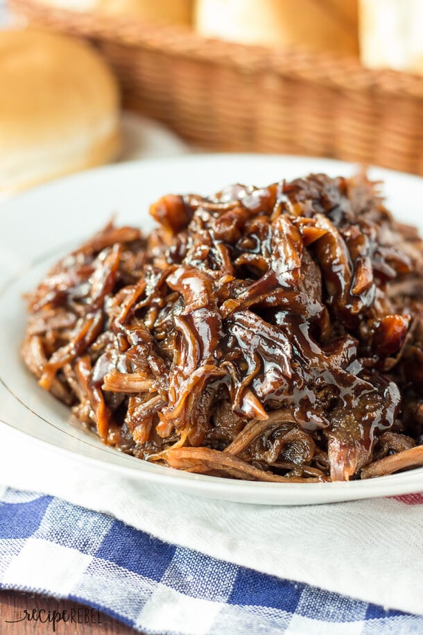 Slow Cooker Honey Balsamic Pulled Pork on a white plate.