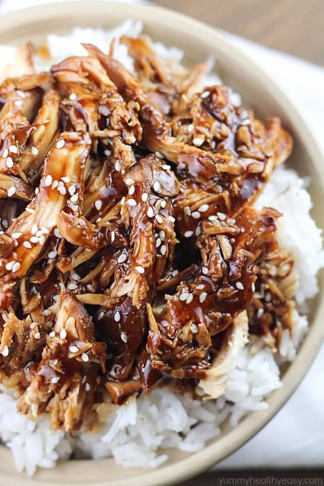 Crock Pot Teriyaki Chicken over a bed of rice in a bowl.