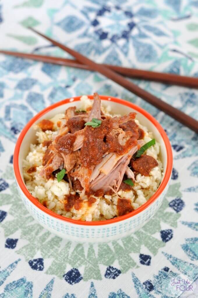 Slow Cooker Chinese Pork in a bowl with chop sticks.