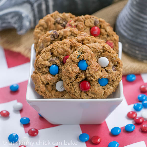 Patriotic Monster Cookies in a white bowl with red, white and blue M&M's.