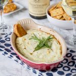 Garlic Herb Baked Goat Cheese Dip - melty, cheesy baked goat cheese dip with lots of garlic and herbs! Pair with a glass of wine and you have the perfect appetizer.