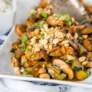 Kung Pao Chicken - quick and easy chicken stir fry packed with veggies and a little kick. Add whatever veggies you want and have dinner ready in minutes!