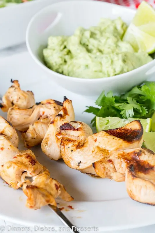 Chicken Skewers - tender pieces of chicken marinated with lots of lime juice and chipotle, then grilled and served with an avocado dipping sauce.