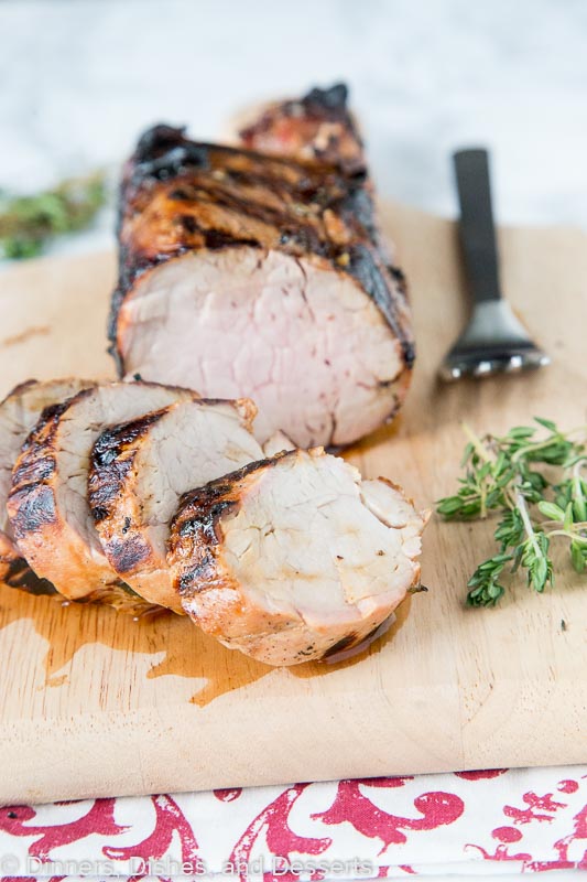 Herb Grilled Pork Tenderloin - a flavor marinade with lemon juice and fresh herbs makes this pork tenderloin super moist and tender. Great on chicken and fish too!