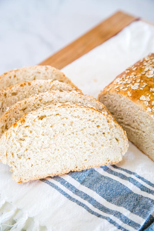 Easy no knead honey oat bread that is great for breakfast, snacking, or dinner