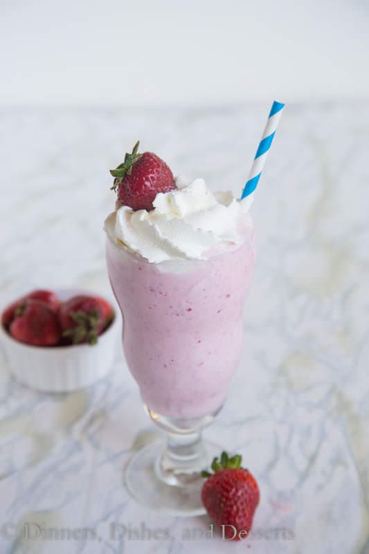 Strawberry Milkshake - Fresh strawberries and vanilla ice cream make for a cool and refreshing treat this summer!