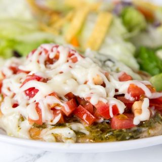 Italian Turkey Cutlets - thick pieces of turkey seared and topped with pesto, tomatoes, and melty cheese. Ready in 15 minutes, and great any night o