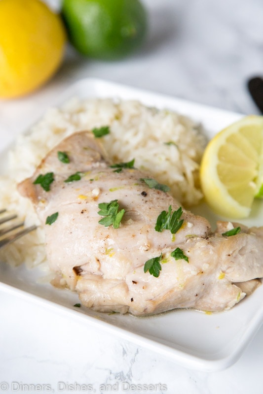 citrus garlic chicken with coconut lime rice on a plate