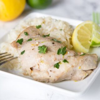 Citrus Garlic Chicken with Coconut Lime Rice - Chicken dinner made with tons of citrus for a bright and fresh dinner. Plus rice cooked in coconut milk and toss with lime for the perfect side dish.