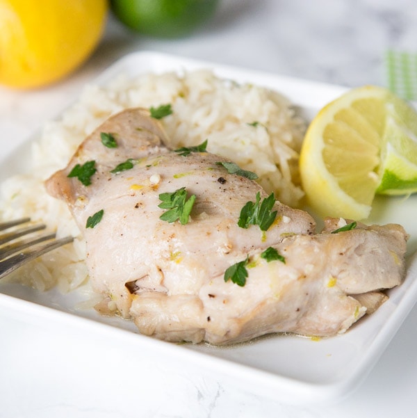 Citrus Garlic Chicken with Coconut Lime Rice - Chicken dinner made with tons of citrus for a bright and fresh dinner. Plus rice cooked in coconut milk and toss with lime for the perfect side dish.
