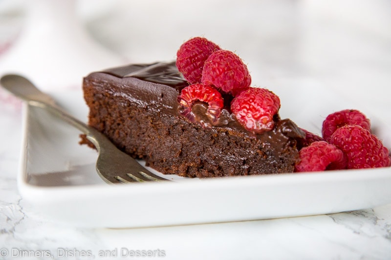 A piece of chocolate cake on a plate, with Flourless chocolate cake and Hazelnut