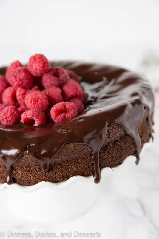 A piece of chocolate cake on a plate, with Flourless chocolate cake and Fudge