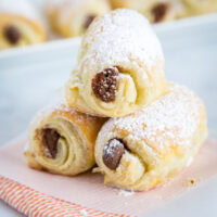 Easy Chocolate Croissants - Use store bought puff pastry to make these flaky homemade croissants filled with chocolate in no time.