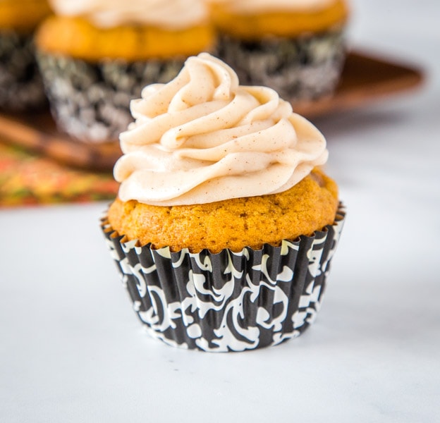 Pumpkin Spice Cupcakes with Cream Cheese Frosting - tender pumpkin cupcakes up all the delicious fall spices and topped with a cinnamon flavored cream cheese frosting.
