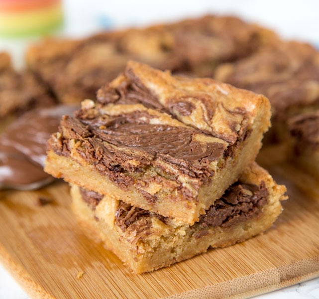 Nutella Swirl Blondies - Quick and easy blondies made in one bowl with a swirl of Nutella. All that buttery and brown sugar taste you love with an extra touch of chocolate.
