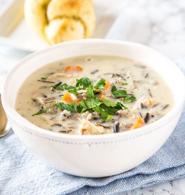 A bowl of soup, with Cream and wild rice