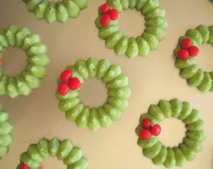 Holly Wreaths cookies on baking sheet