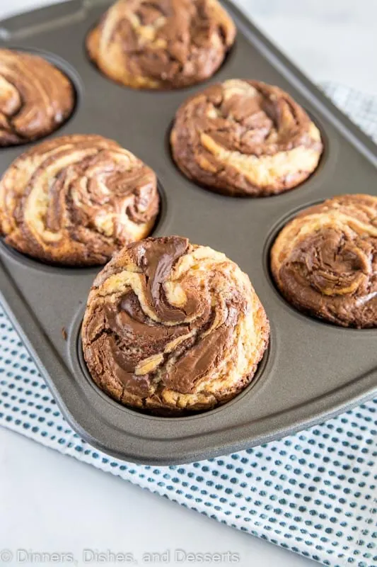 nutella muffins in a muffin tin