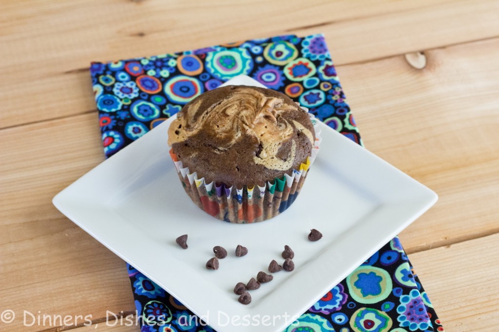 Double Chocolate Peanut Butter Swirl Muffins - Soft and tender Double Chocolate Muffins, with a swirl of peanut butter on top!