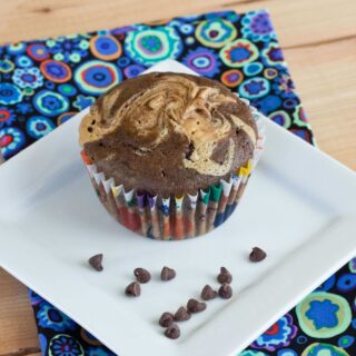 Double Chocolate Peanut Butter Swirl Muffins - Soft and tender Double Chocolate Muffins, with a swirl of peanut butter on top!