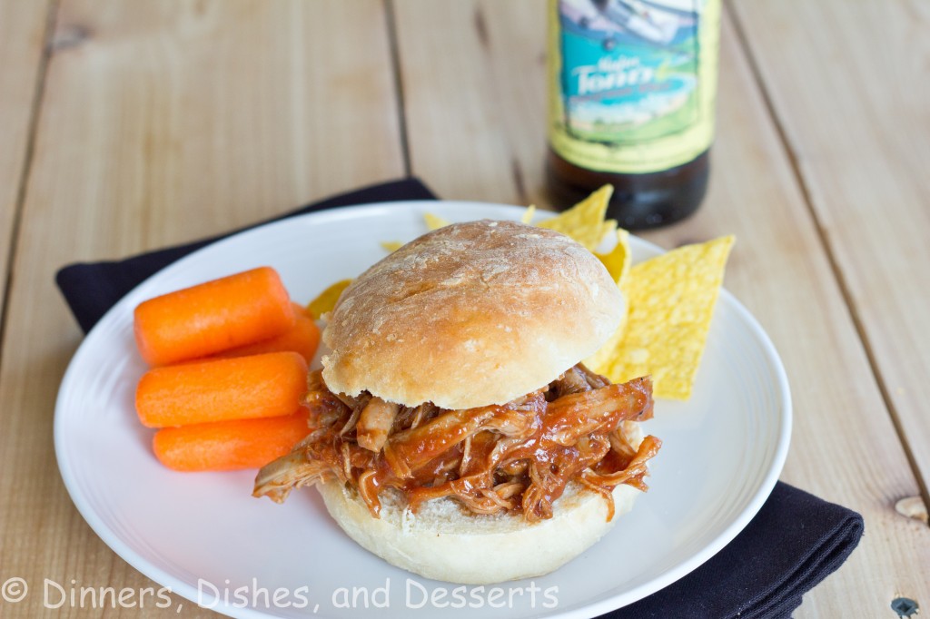 Barbecue Pulled Pork Sandwiches - slow cooker pulled pork that is tender, juicy and delicious. Cooked in a sweet and tangy barbecue sauce for the perfect sandwich!