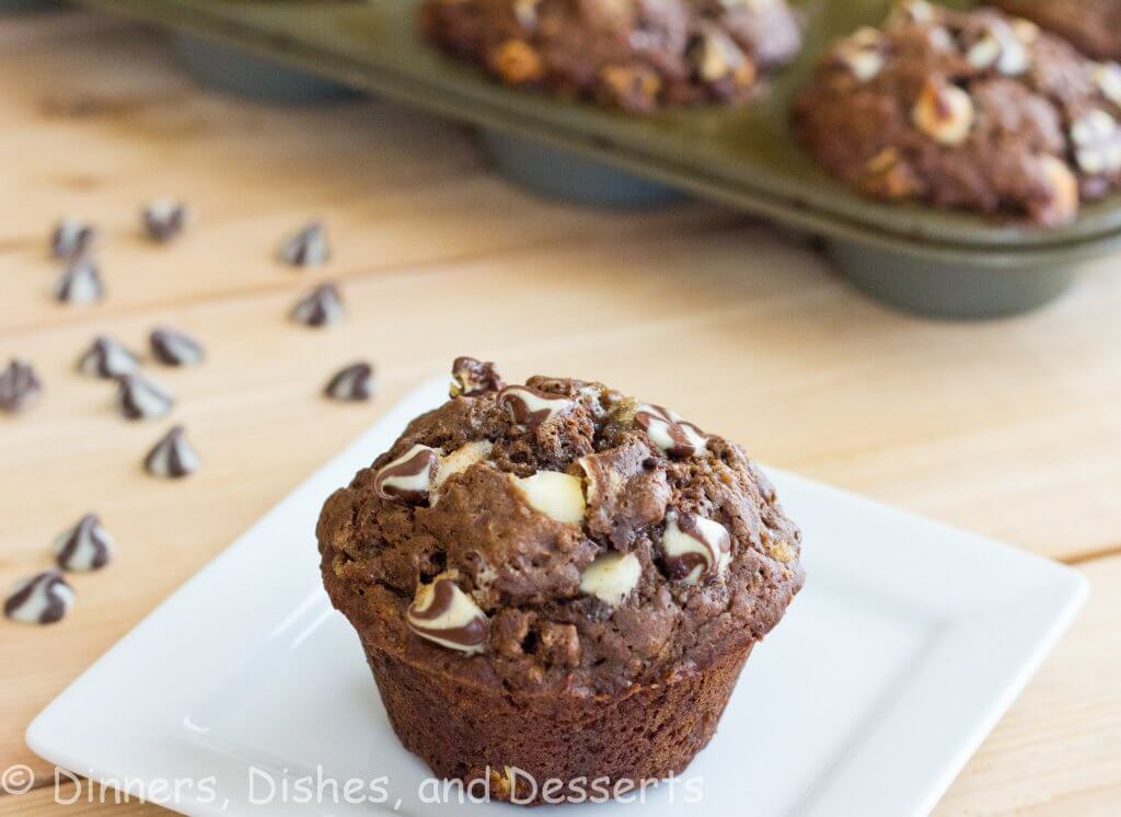 chocolate banana white chocolate chip muffins on a plate