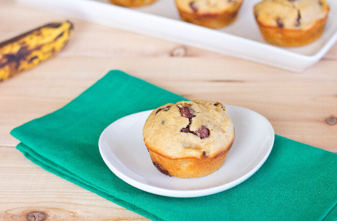 Peanut Butter Banana Chocolate Chip Muffins on white plate