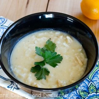 Avgolemono Soup - a classic Greek soup that is light, delicious and the perfect way to warm up on a cold day.  A lemon chicken and rice soup you are going to love!