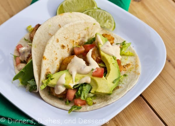 Baja Shrimp Tacos - a fun twist on taco night based on Red Robin's recipe. Slightly spice shrimp with a chipotle lime sauce!