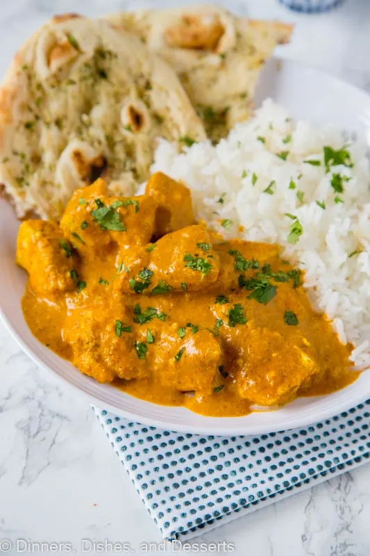 Chicken masala on a plate with rice
