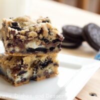 double cookies and cream kiss bars on a plate