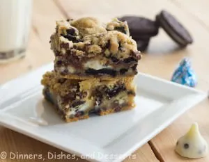 double cookies and cream kiss bars on a plate