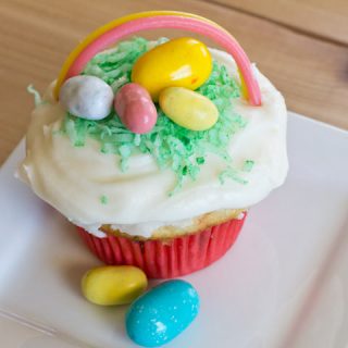 easter basket cupcakes on a plate