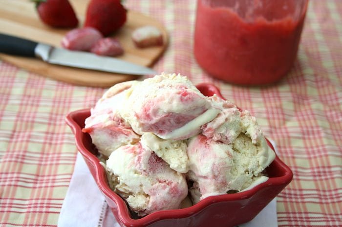 strawberry rhubarb swirl ice cream in a bowl