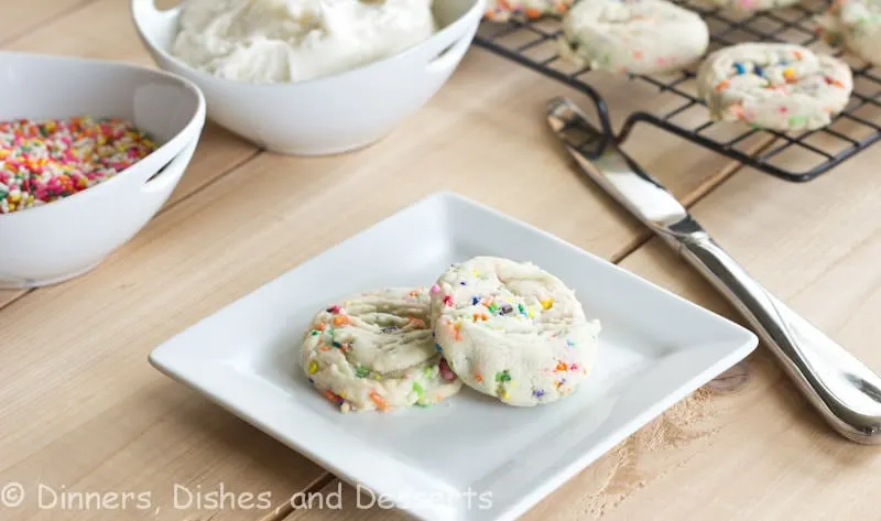 Funfetti Sandwich Cookies - Made from scratch funfetti cookies sandwiched with buttercream frosting. Because sprinkles just make everything more fun!