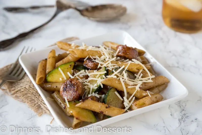 balsamic pasta with chicken sausage and veggies on a plate