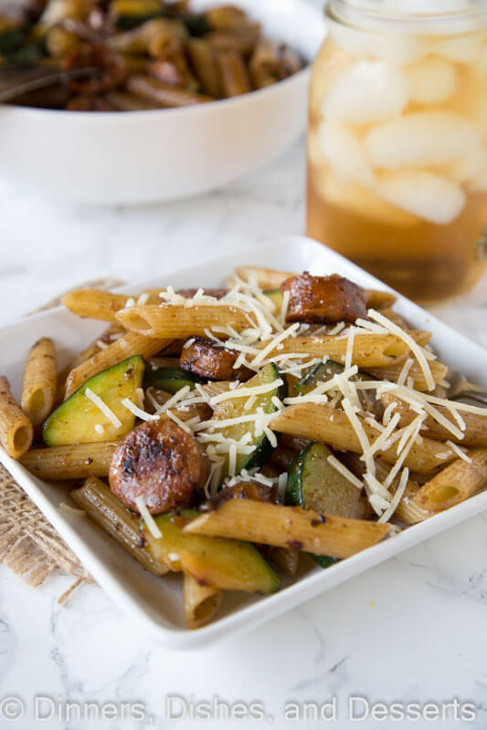 balsamic pasta with chicken sausage and veggies on a plate