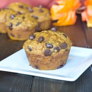 Pumpkin Chocolate Chip Muffins - Healthy version of homemade pumpkin muffins with lots of chocolate chips. Perfect to have in the freezer for a busy morning or an after school snack.