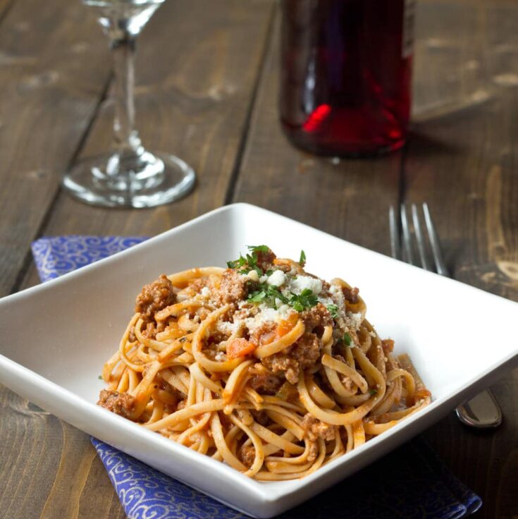 An authentic Beef Ragu Sauce, served with linguini.
