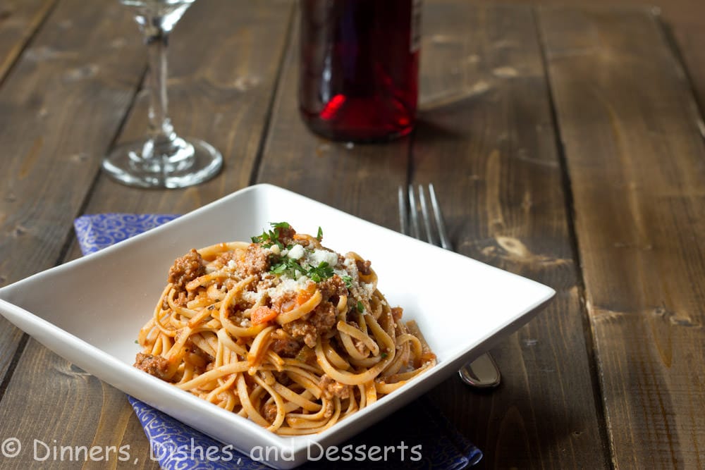 linguini with beef ragu sauce on a plate