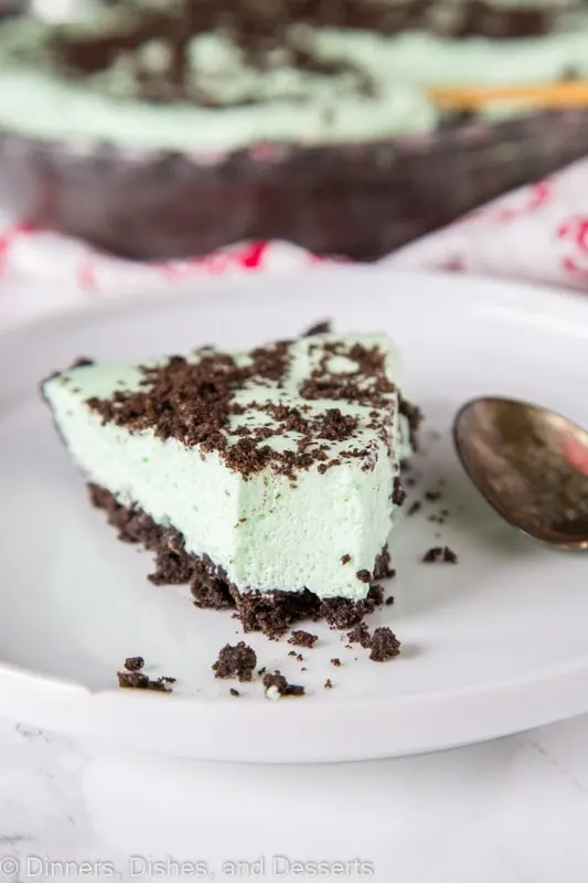 slice of mint pie with bite taken out of it