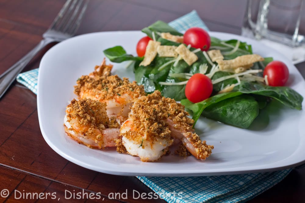 crispy baked shrimp on a plate with salad