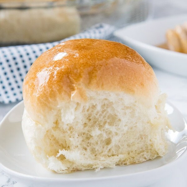 A dinner roll on a plate