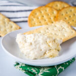 Hot Artichoke Dip Recipe - this baked artichoke dip is creamy, cheesy, and the perfect appetizer for any get together.  Easy to make ahead and always disappears quickly!