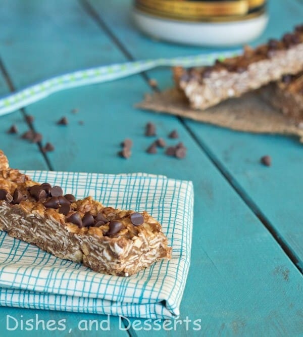 chocolate peanut butter granola bars on a napkin