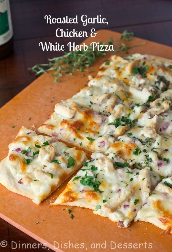 Roasted Garlic, Chicken & Herb White Pizza - Roasted garlic sauce topped with chicken, red onions, and herbs. A great white pizza that will rival any pizza out there!