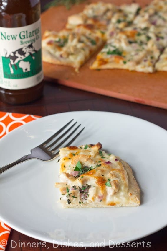 Roasted Garlic, Chicken & Herb White Pizza - Roasted garlic sauce topped with chicken, red onions, and herbs. A great white pizza that will rival any pizza out there!